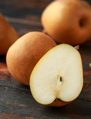 Healthy Organic slice of Pears on a wooden table
