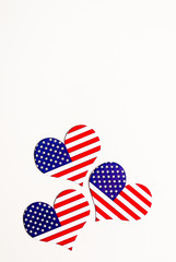 American Independence day background with blue, white and red mixed stars and hearts. Celebration of American independence day, the 4th of July (the Fourth of July). Holiday concept. With copy space. 
