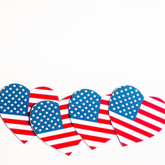 American Independence day background with blue, white and red mixed stars and hearts. Celebration of American independence day, the 4th of July (the Fourth of July). Holiday concept. With copy space. 