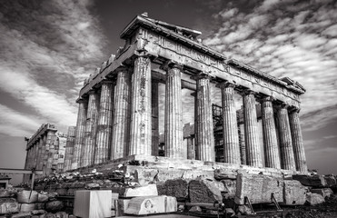 Parthenon in black and white, Athens, Greece. Ancient Greek Parthenon is a top landmark of Athens. Dramatic view of remains of the antique Athens city. Famous temple ruins on the old Acropolis.