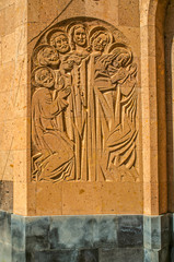 Carved on stone the Holy martyrs on the wall of the oval portal at the entrance to the Church of the Holy Martyrs in the village of Teghenik  of Armenia