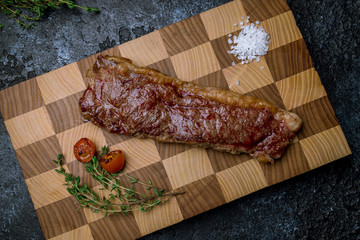 juicy Striploin Steak on board
