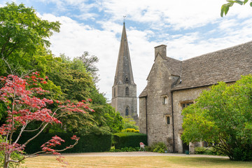 The parish church of All Saints in Bisley, a picturesque Cotswold village in Gloucestershire,...