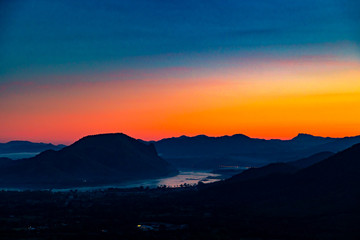 Scenic Colorful Landscape Sunrise in the Morning on The Hill at Phu Tok, Chiang Khan, Loei, Thailand.