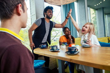 international people drinking tea(coffee) in cafe