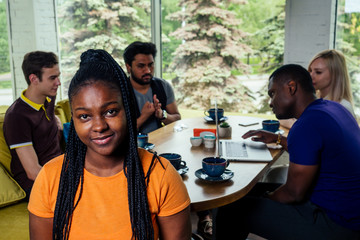 international people drinking tea(coffee) in cafe