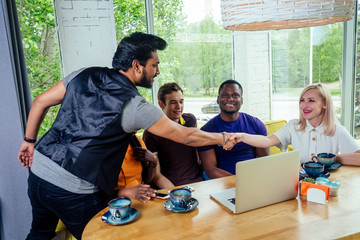 international people drinking tea(coffee) in cafe