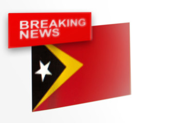 Breaking news, East Timor country's flag and the inscription news