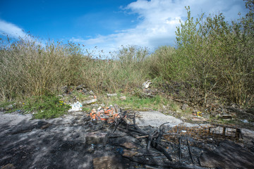 Site of former gas works, now derelict and overgrown after many years of disuse.