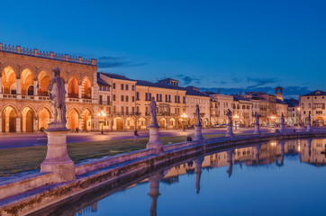 Prato della Valle in Padua city with city lights during the blue hour