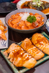 Salmon Sashimi and Salmon with Sauce Japanese Food on the Wood Table.