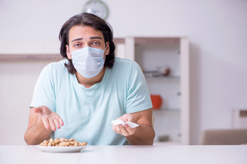 Young man suffering from allergy 