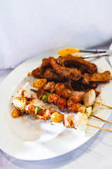Grilled Pork Barbecue  and Pork Chop Steak on White Plate.