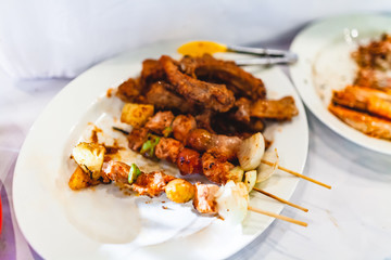 Grilled Pork Barbecue  and Pork Chop Steak on White Plate.