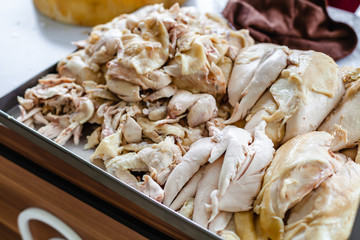 Chickens for Hainanese Chicken Rice on Tray.