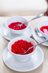 Chinese Dessert for Bride and Groom in Chinese Traditional Wedding Ceremony  in ceramic bowls with spoon.