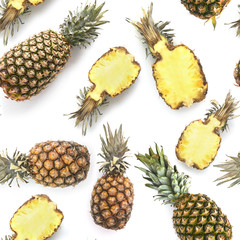 Pineapples isolated on white background, top view. Fresh pineapple pattern.