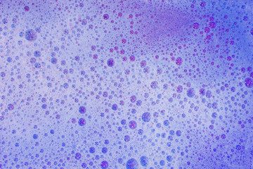 Soap bubbles background- suds liquid