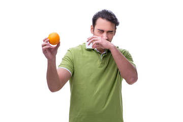 Young man suffering from allergy isolated on white
