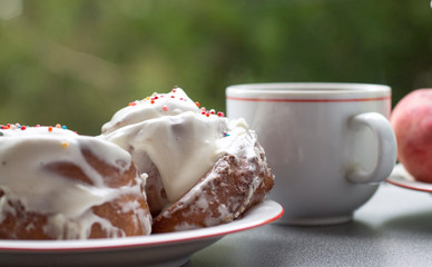 Breakfast with buns Cinnabon and coffee