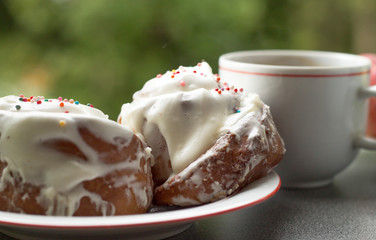 Breakfast with buns Cinnabon and coffee