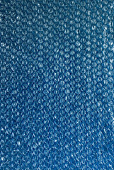 plastic background texture cellophane wrapping packing wrap packet bead ball brilliant blue sky indigo cyan color