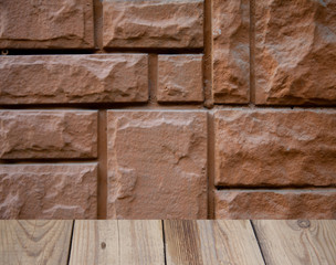 tile background on brown wall with wooden table