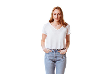 Fototapeta premium Portrait of a happy woman standing with arms folded isolated on a white background