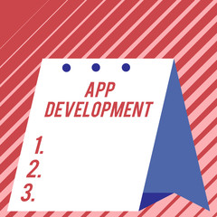 Text sign showing App Development. Business photo showcasing Development services for awesome mobile and web experiences Modern fresh and simple design of calendar using hard folded paper material