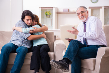 Young pair visiting experienced doctor psychologist