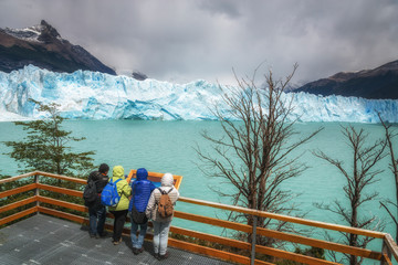 Tourist on the Perito Moreno Glacier. El Calafate, Argentina. Los Glaciares National Park,...