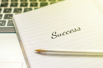 Writing note showing Success. Inspirational motivating quote on notebook