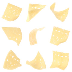 Set of flying delicious cheese on white background