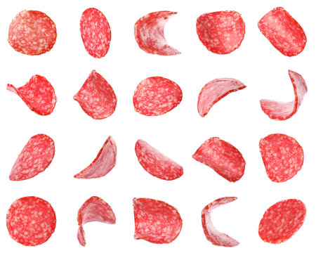 Set of flying cut fresh sausage on white background