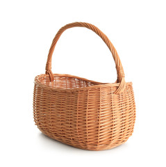 Empty wicker picnic basket isolated on white