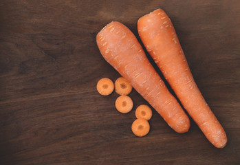 fresh carrot on wooden background