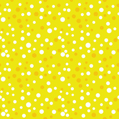 Seamless polka dot pattern. Geometric vector background in yellow. Spot of different sizes placed randomly. Useful for fabric print, interior decorating, home textiles, cloth, wrapping paper, apparel