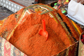 A bunch of spices in a box on the market in Antalya. - Powered by Adobe