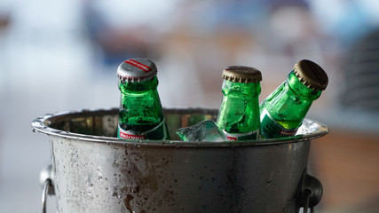 A bucket of cold iced beer bottles in Kingstown, Saint Vincent and the Grenadines, Caribbean.