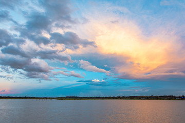Sky and cloud at sunset with sunset light effects background. clouds twilight and dramatic sky background.