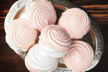 Silver plate of strawberry vanilla marshmallow or zephyr. Top view.