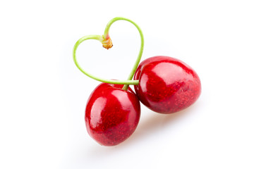 heart shaped cherry on white background