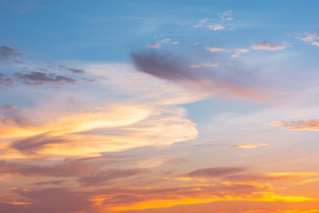 Sky and cloud at sunset with sunset light effects background. clouds twilight and dramatic sky background.
