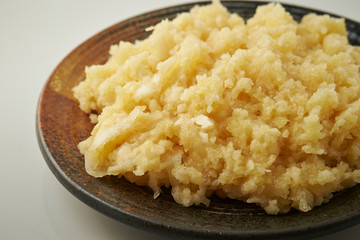 Grated ginger on plate