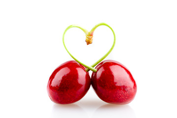 heart shaped cherry on white background