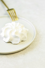 Marshmallow on grey plate