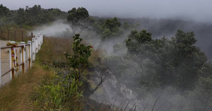 the steaming bluff in hawaii volcano nation park. a lei places on one of the posts keeping tourist from falling into halemaumau crater.