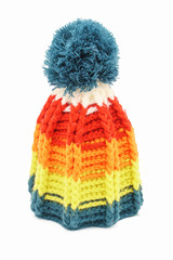 Colorful winter knitted hat on a white background. Handwork. Winter fashion concept for men, women and children.