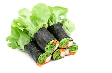 Fresh vegetable salad rolls with sheet seaweed isolated on white background, Closeup vegetable salad rolls for or wallpaper, Break fast vegetable salad rolls with nori seaweed