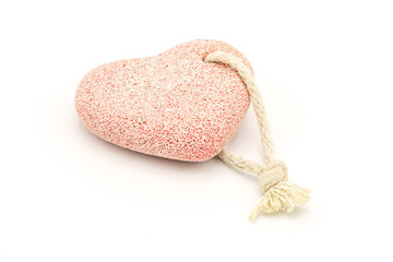 Natural pumice stone on white background. Feet care concept, pedicure and spa. Copy space